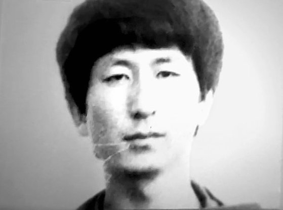 재소자 신분카드에 부착된 이춘재의 사진. [JTBC 캡처]